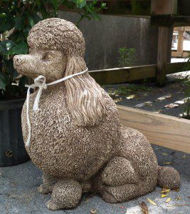 "No flash photography, please". Fifi the poodle is one of the classiest statues we have here. Her immaculately groomed coat and perfectly trimmed nails will NEVER make a mess in the house.